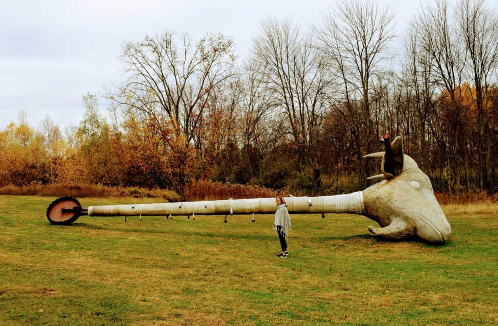 visitor in sculpture park