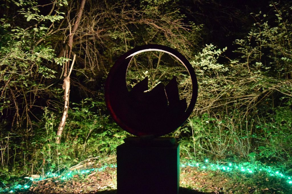 sculpture illuminated at night